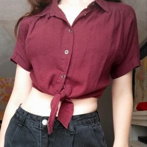 Short sleeve button down top in a port wine color